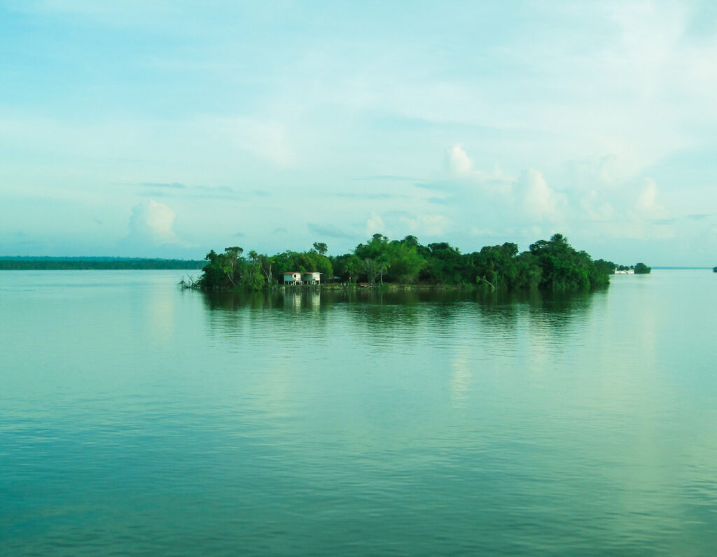 A small island in the middle of a lake.