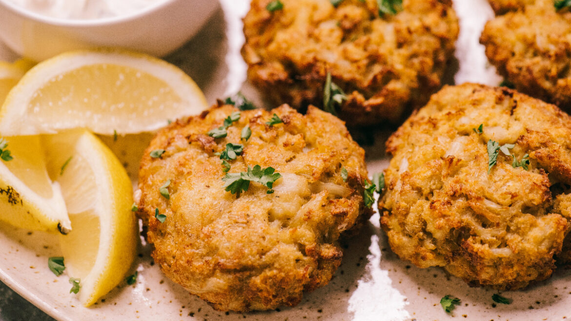 A close up of some crab cakes on a plate